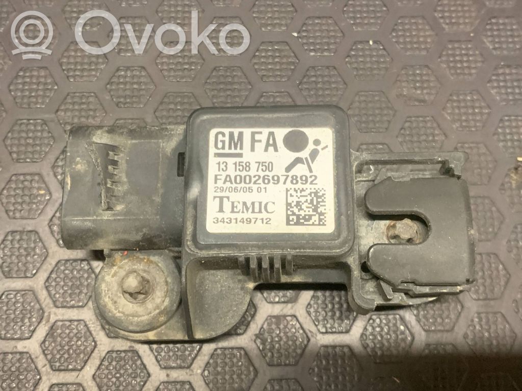 Opel Zafira B Датчик удара надувных подушек 