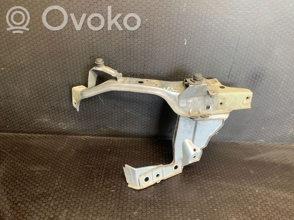 Opel Zafira B Uchwyt / Mocowanie lampy przedniej 