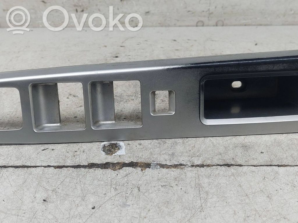 Mazda 5 Front door window switch trim 