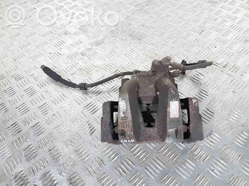 Citroen C4 Grand Picasso Zacisk hamulcowy przedni 