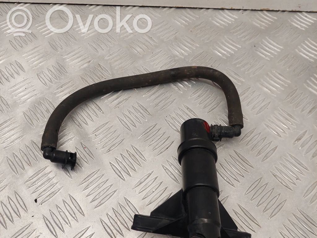 Headlight washer spray nozzle