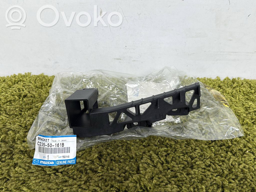 Mazda 5 Headlight/headlamp mounting bracket 