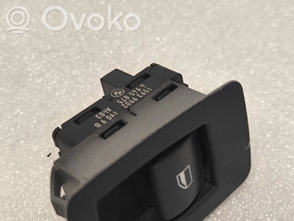 Electric window control switch   6945875,15939902