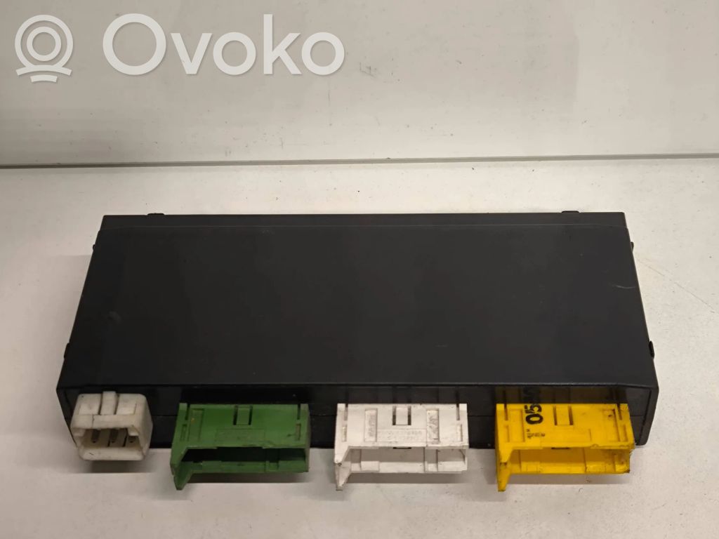 BMW 5 E34 Komforto modulis 