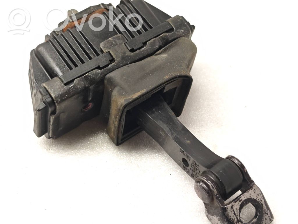 Front door check strap stopper   7193671
