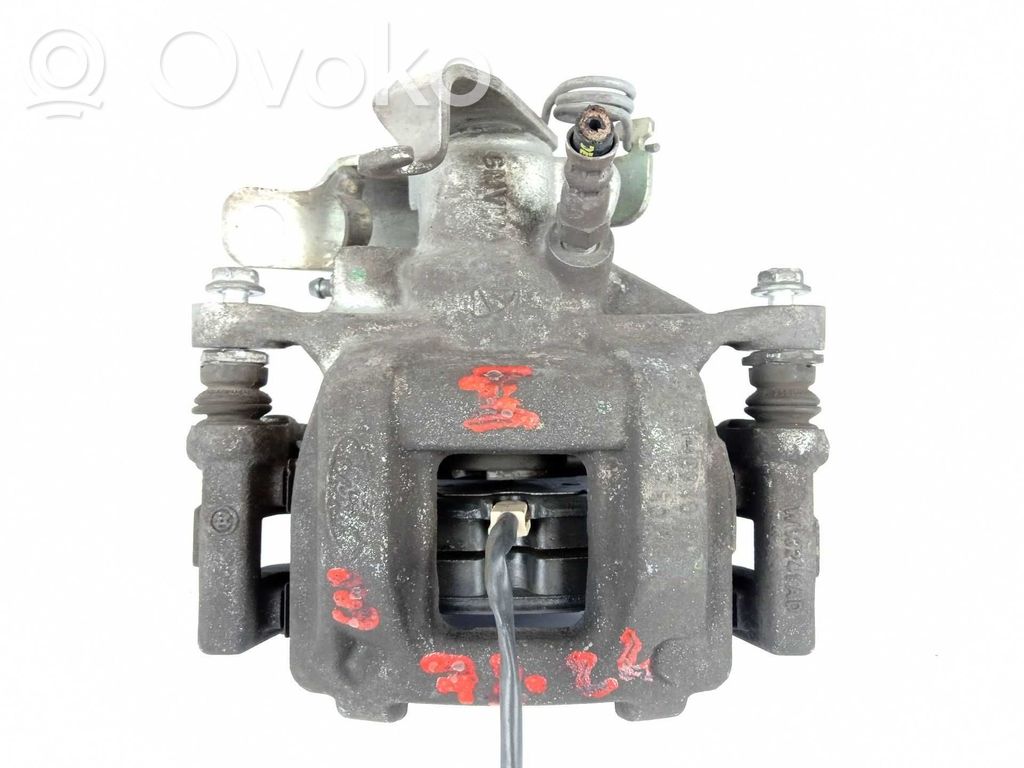 Caliper del freno trasero   1843326