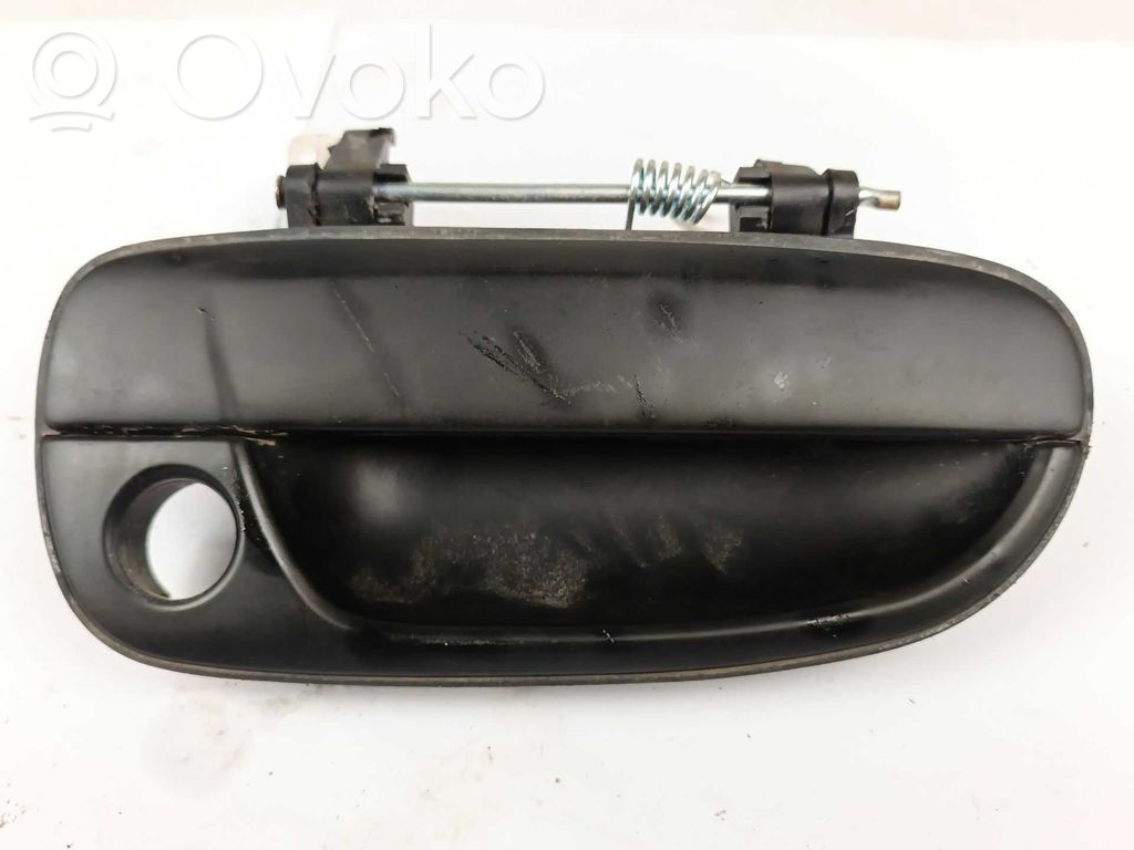 Hyundai Accent Manecilla externa puerta delantera 