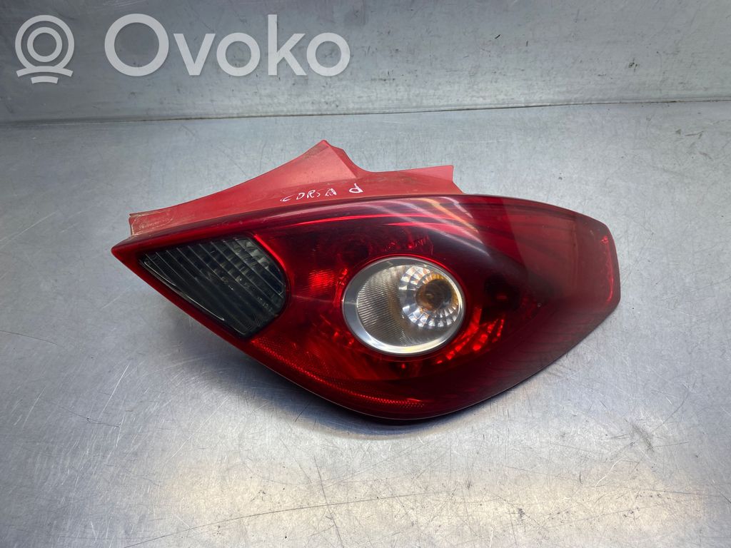Opel Corsa D Aizmugurējais lukturis virsbūvē 