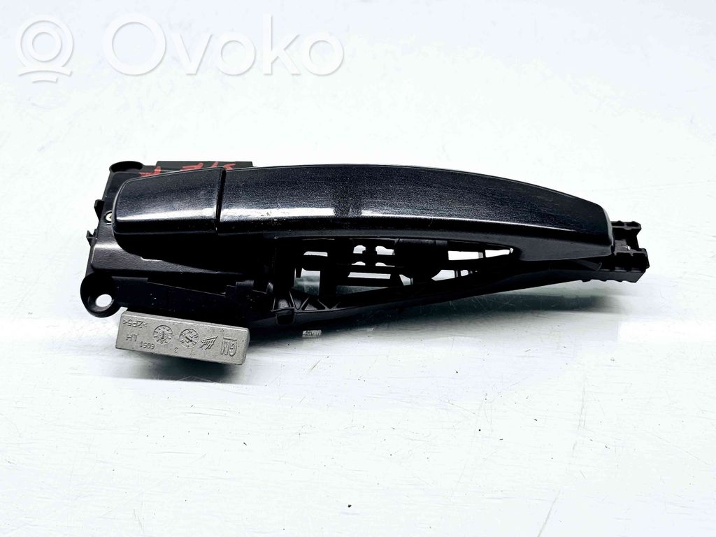Opel Astra J Front door exterior handle 