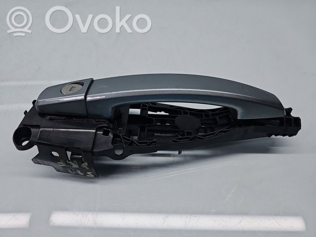 Opel Astra J Front door exterior handle 