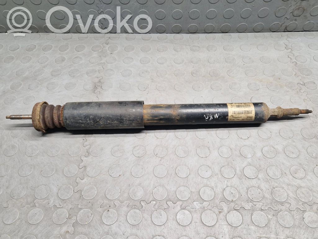 BMW 1 E81 E87 Aizmugurē amortizators 