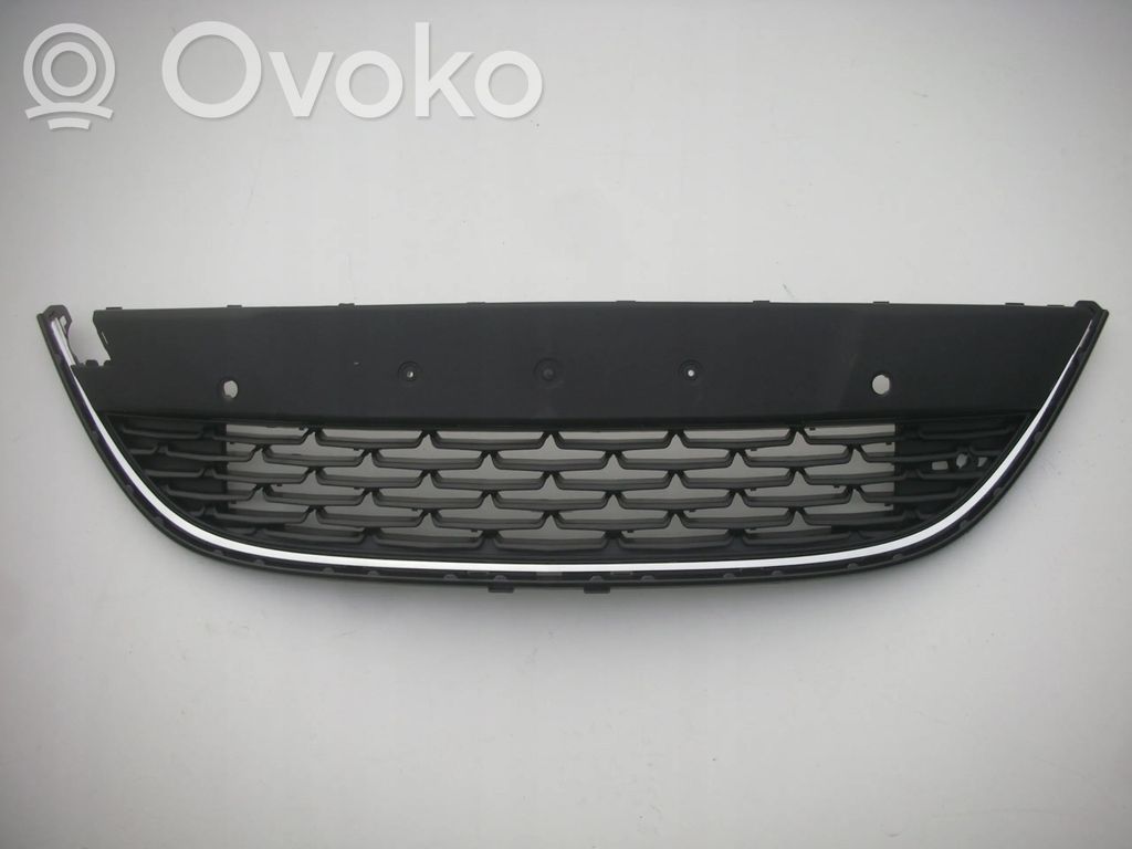 Opel Astra J Maskownica / Grill / Atrapa górna chłodnicy 