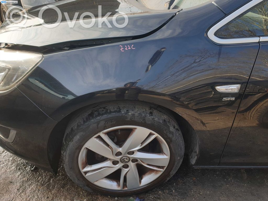 Opel Astra J Błotnik przedni 