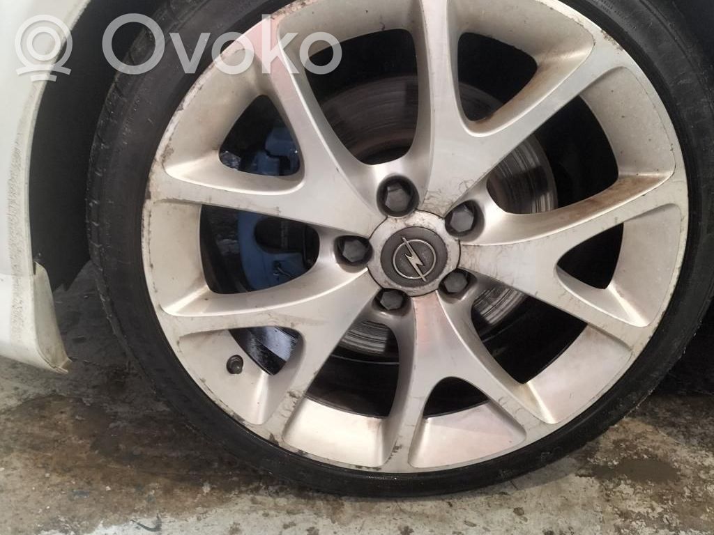 Opel Corsa D Zacisk hamulcowy przedni 