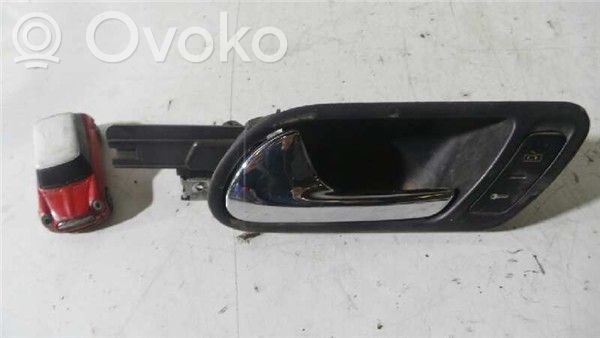 Volkswagen Golf V Front door interior handle 
