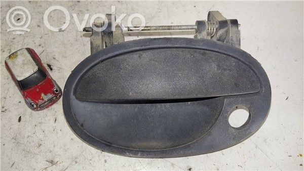 Opel Combo C Front door exterior handle 