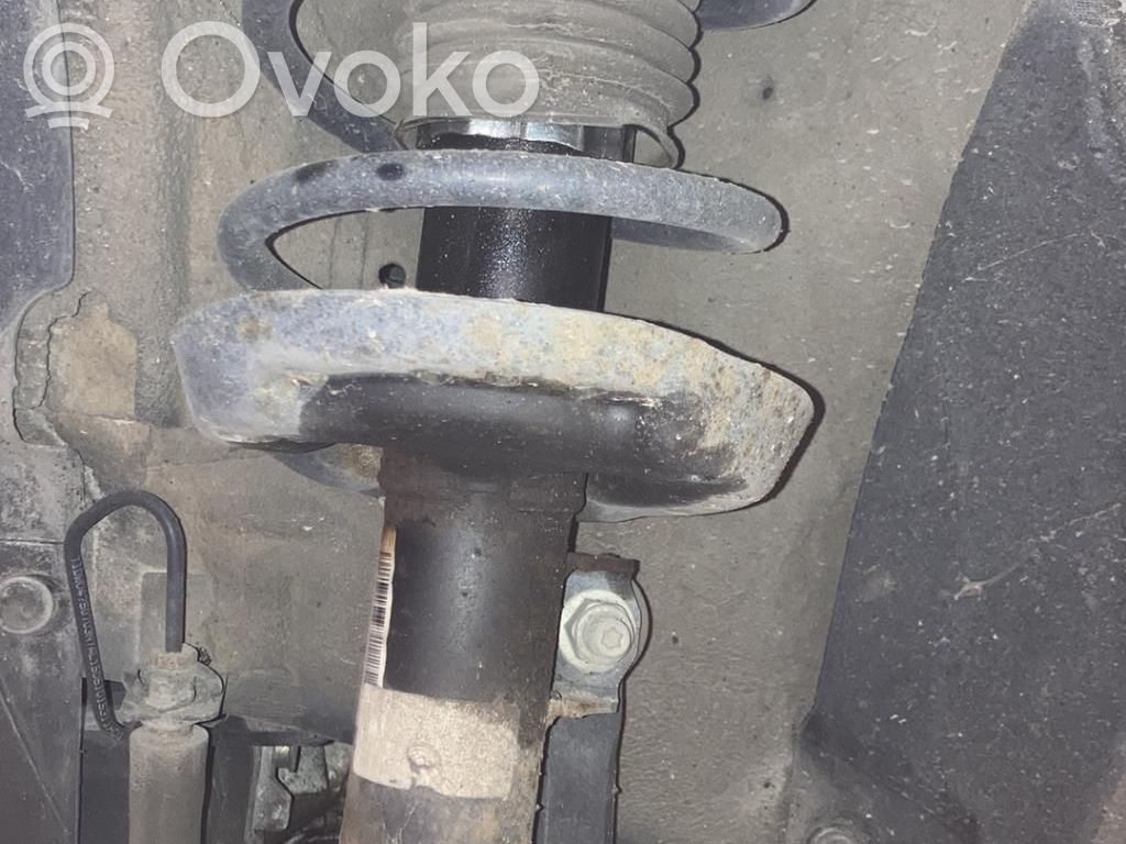 Opel Astra J Amortyzator osi przedniej ze sprężyną 