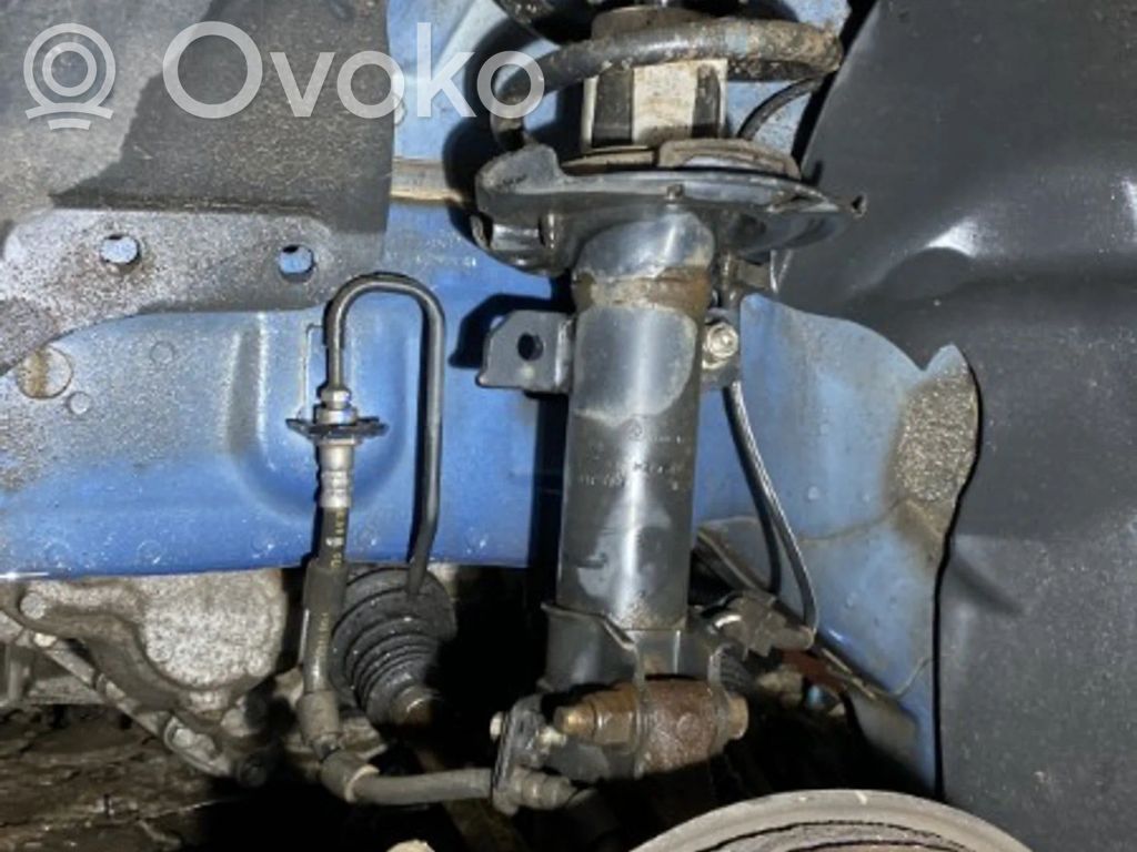 Ford Transit Courier Etuiskunvaimennin kierrejousella 