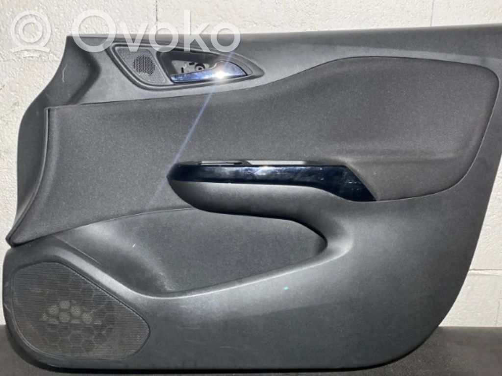 Opel Corsa E Обшивка передней двери 