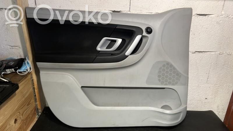 Skoda Fabia Mk2 (5J) Revestimiento de puerta delantera 