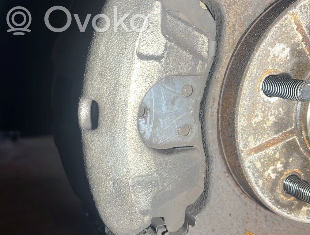 Chrysler Sebring (JS) Zacisk hamulcowy przedni 