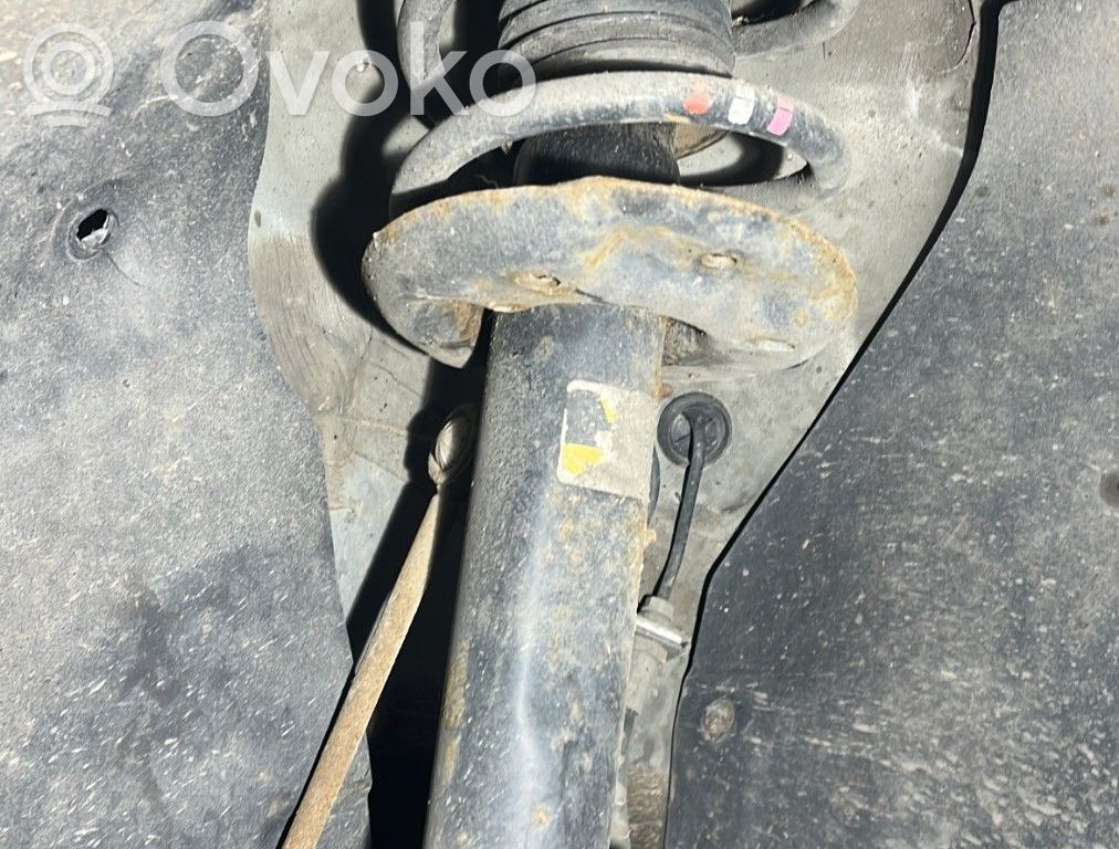 Volkswagen Golf VI Amortyzator osi przedniej ze sprężyną 