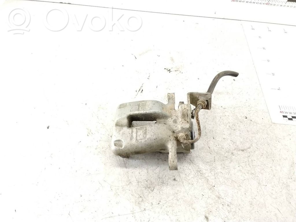 Volkswagen PASSAT B6 Tylny zacisk hamulcowy 