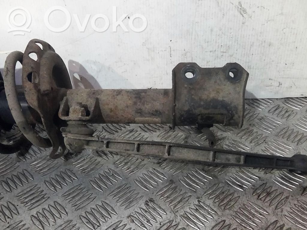 Opel Astra H Amortyzator osi przedniej ze sprężyną 