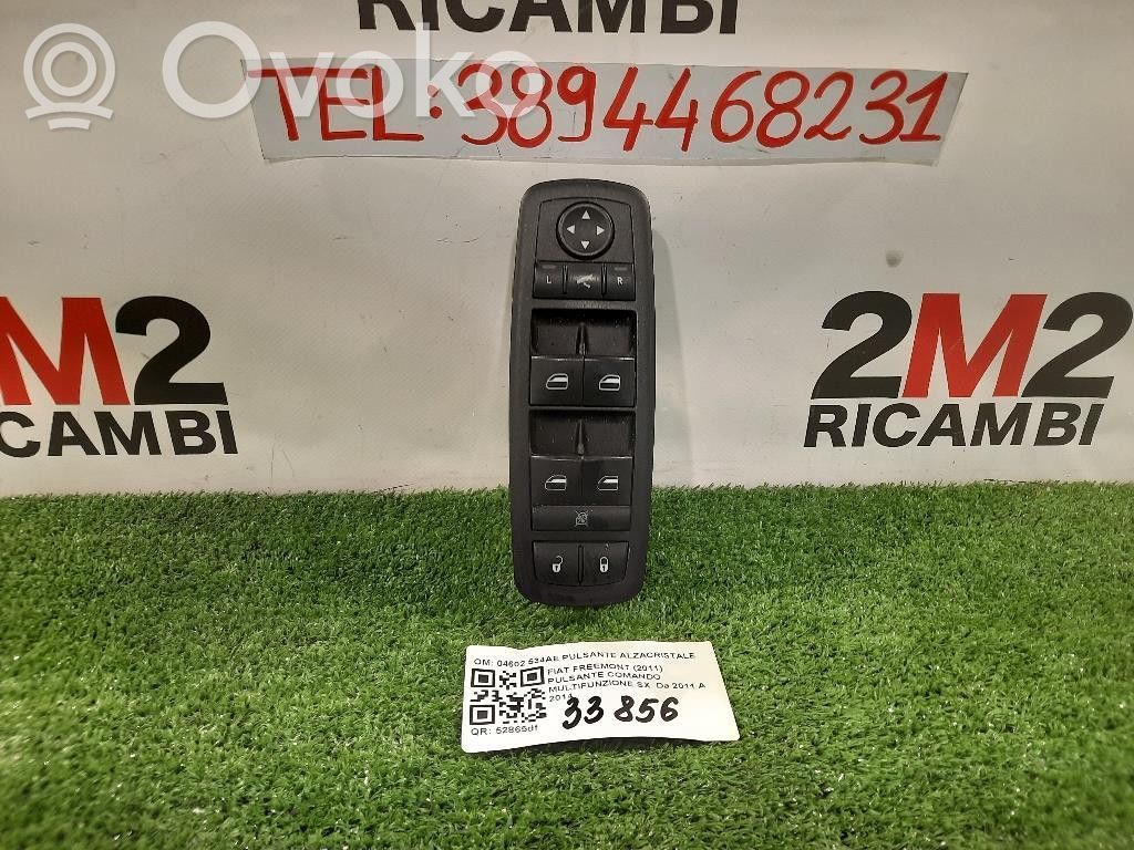 Electric window control switch   04602534AE