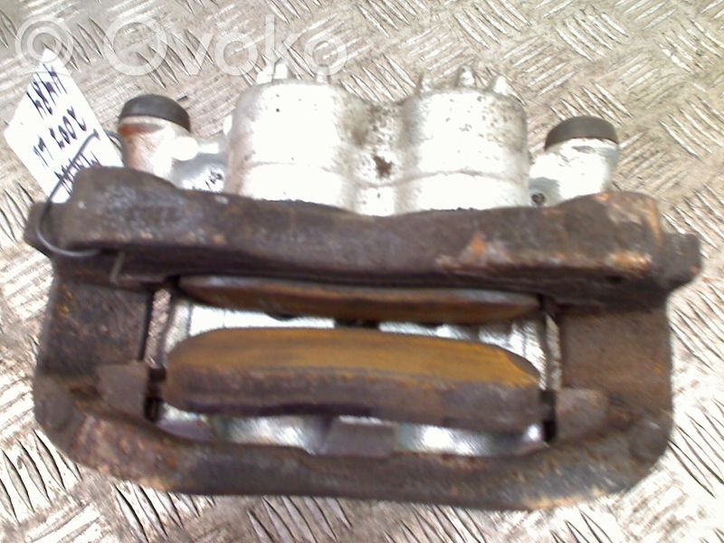 Caliper de freno delantero