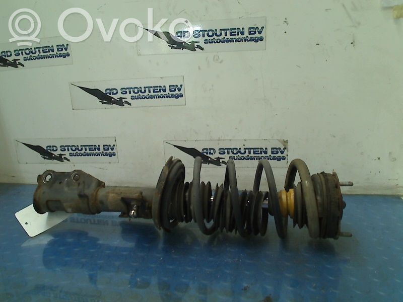 Front shock absorber with coil spring