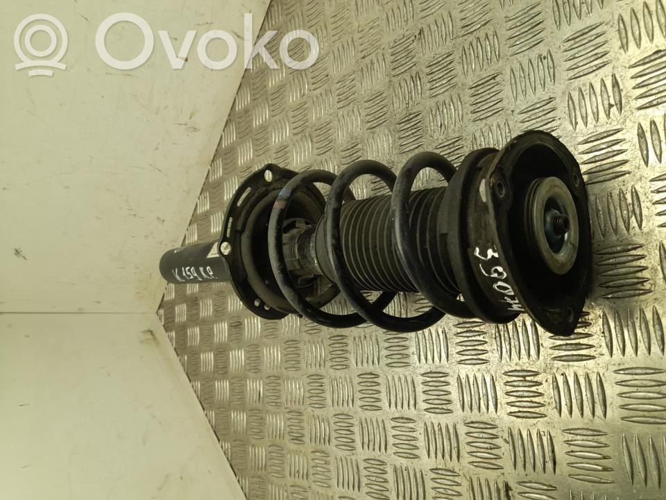 Skoda Octavia Mk4 Amortyzator osi przedniej ze sprężyną 