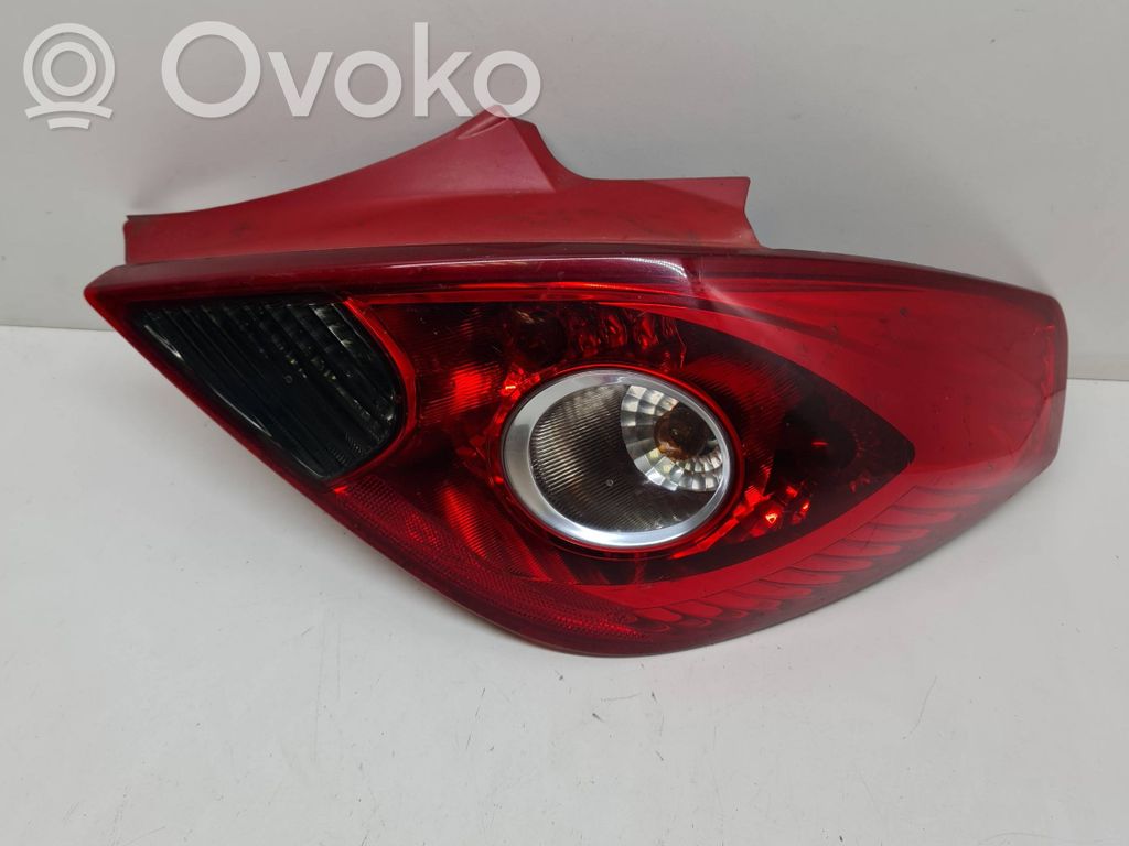 Opel Corsa D Aizmugurējais lukturis virsbūvē 