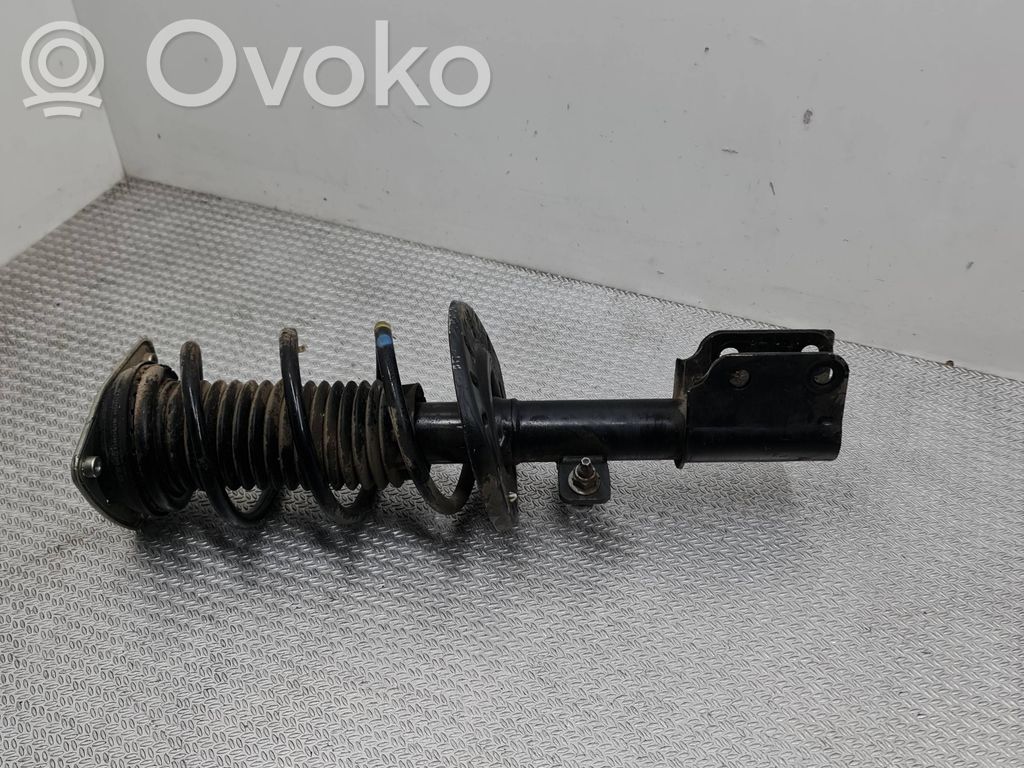 Peugeot Partner III Front shock absorber with coil spring 