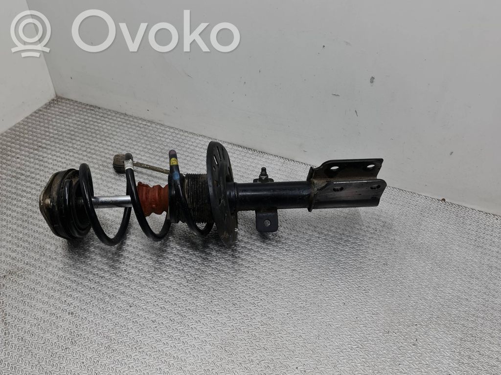 Peugeot Partner III Front shock absorber with coil spring 