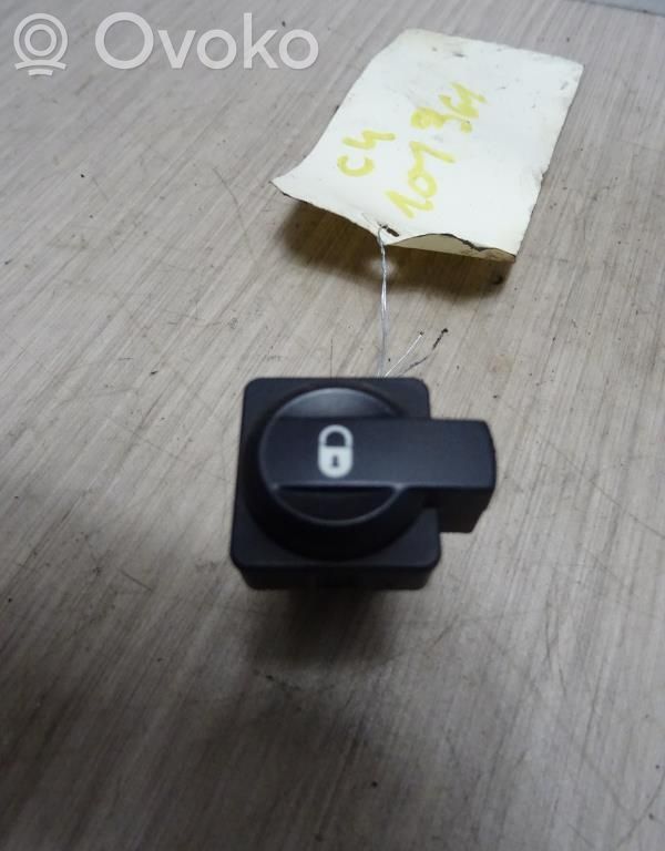 Botón interruptor de bloqueo de puertas