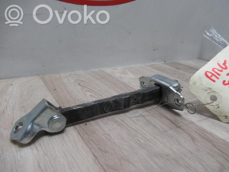 Takaoven lukon laukaisin