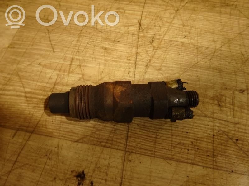 Inyector de combustible