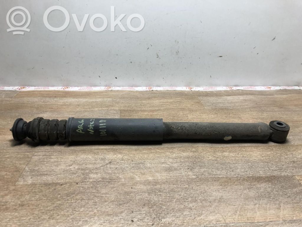 Nissan Note (E11) Aizmugurē amortizators 