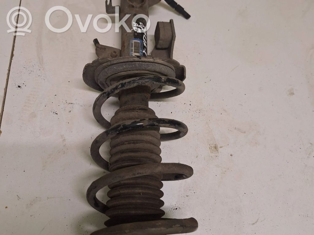 Front shock absorber with coil spring