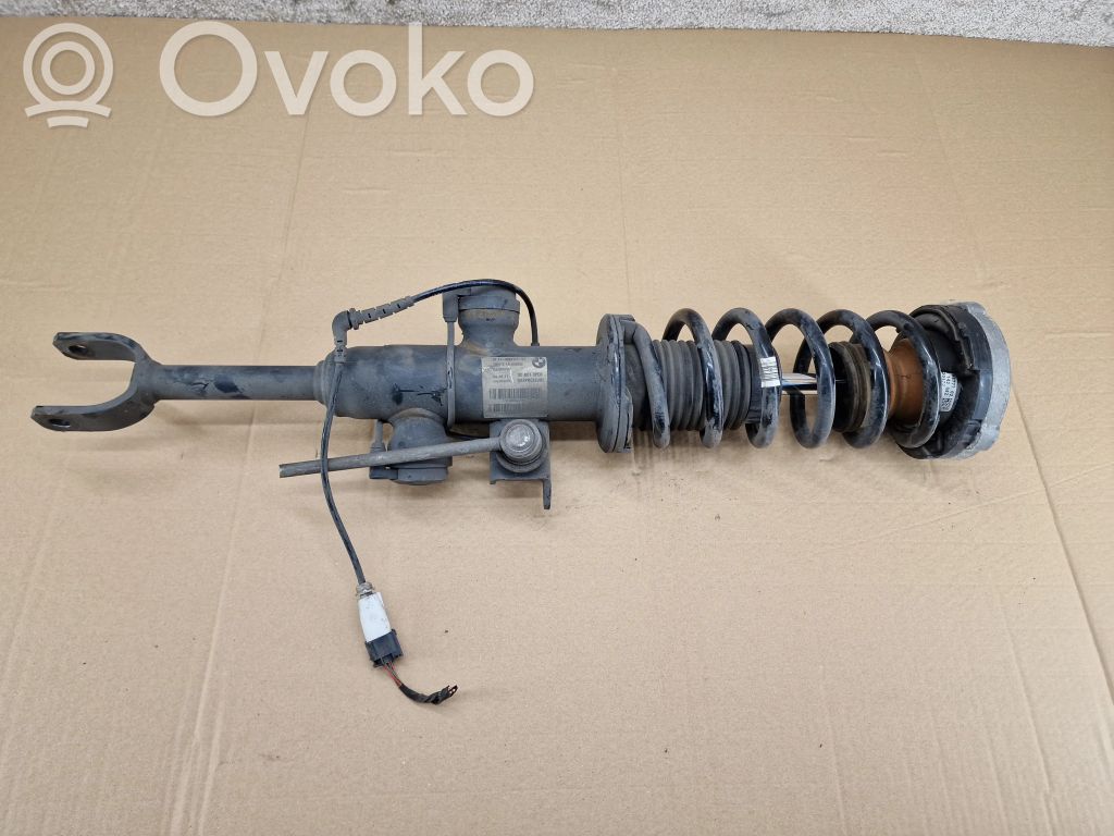 Amortyzator osi przedniej ze sprężyną   6863117