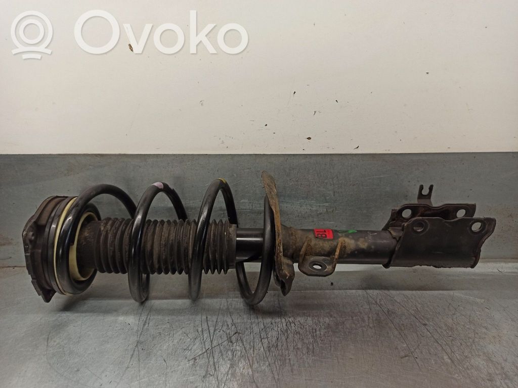 Renault Koleos I Amortyzator osi przedniej ze sprężyną 