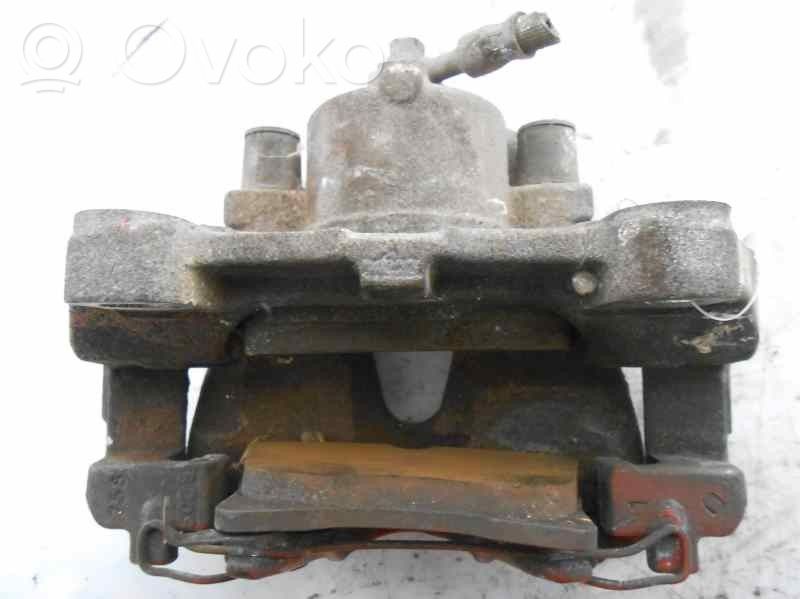 Opel Astra G Front brake caliper 