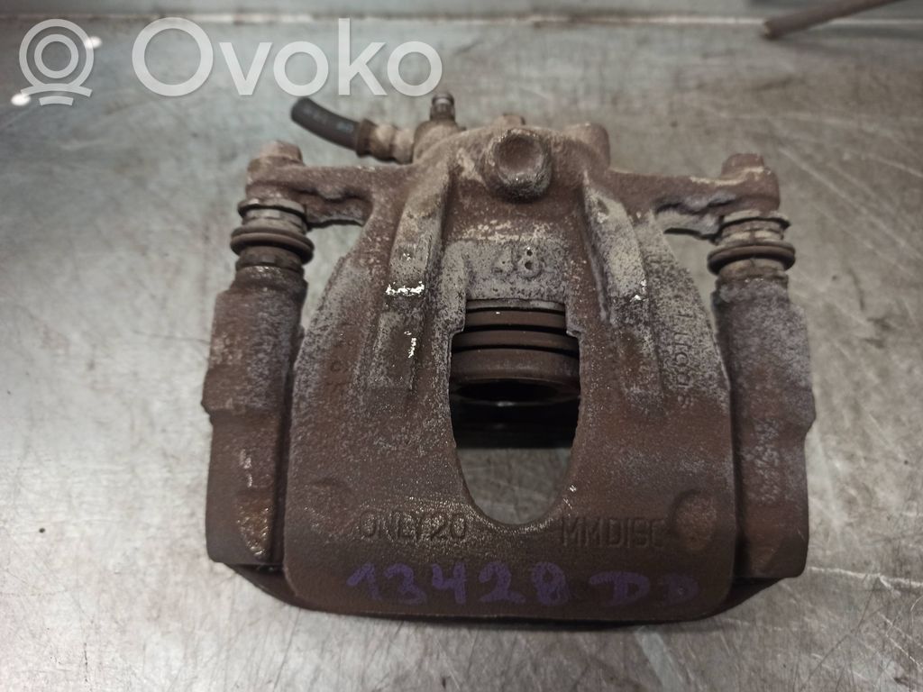 Opel Corsa C Zacisk hamulcowy przedni 