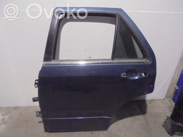 Cadillac SRX Задняя дверь 