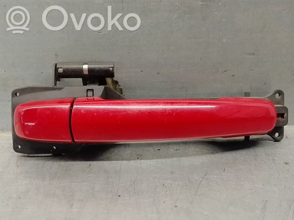 Suzuki Swift I Manecilla externa puerta delantera 