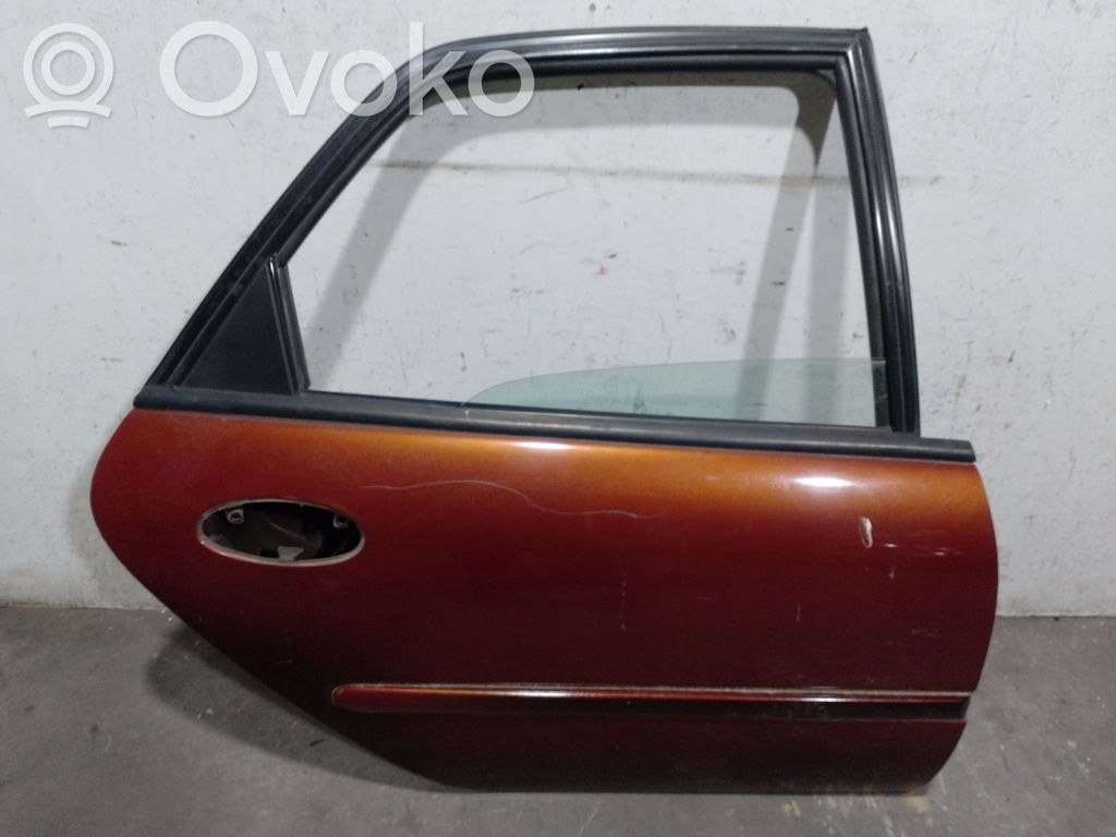 Puerta trasera   7700823402