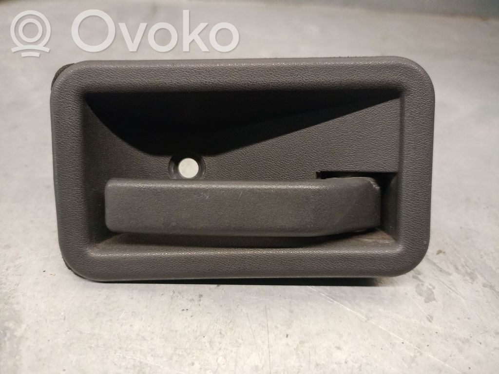Manecilla interna puerta delantera   7700813586