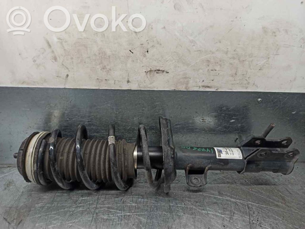 Opel Corsa D Amortyzator osi przedniej ze sprężyną 