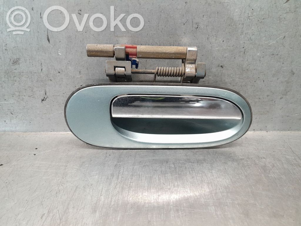 Nissan Almera N16 Manecilla externa puerta trasera